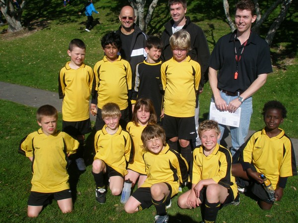 The victorious Glenfield Rovers Cougars are: Back row from left: coaches Mike Wiig, Mark Bindon and Phillip McIntosh. Middle row, from left: Josh Poffley, Yash Lal, Stefan Wiig, Aaron Cordes. Front row, from left: Thomas Reid, Blair McIntosh, Hayley Bindo